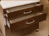 Two open drawers in a walnut finish