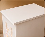 White top edge of the mandir showing the wood finish